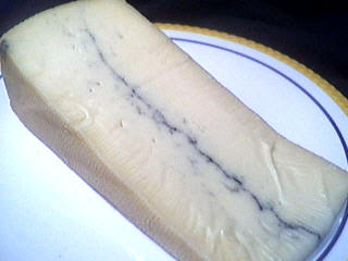 Photo : Tranche de fromage morbier