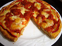 Image : Pizza au seigle et sa garniture aux artichauts et mozzarella