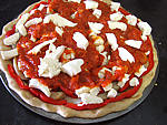 Pizza au seigle et sa garniture aux artichauts et mozzarella - 22.2