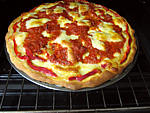 Pizza au seigle et sa garniture aux artichauts et mozzarella - 23.2