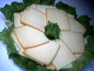 Photo : Tranches de fromage de raclette