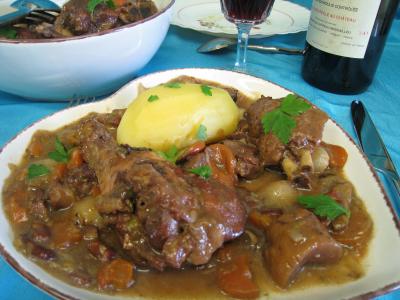 Photo : Coq au vin aux cèpes façon auvergnate
