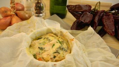 Blancs de poulet en papillotes aux herbes aromatiques et au roquefort