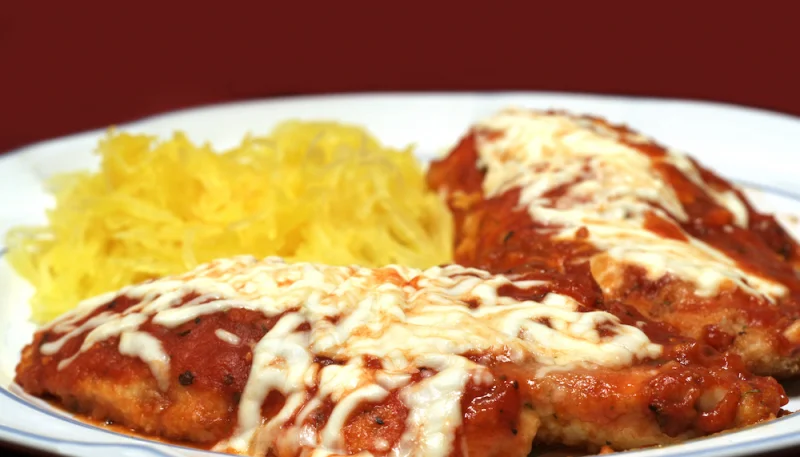 Poulet à la tomate et à l'emmental